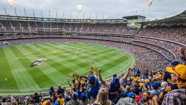 Joy for Eagles fans in the MCG crowd of 100,022. Picture: Jason Edwards