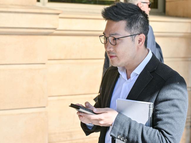 ADELAIDE, AUSTRALIA - NewsWire Photos October 18, 2023: Adelaide City Councillor Jing Li outside the court of Disputed Returns where his Adelaide City Council election victory is being contested. Picture: NCA NewsWire / Brenton Edwards