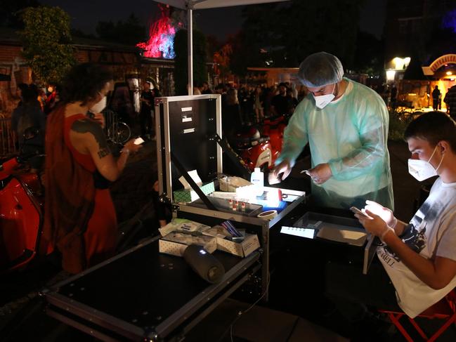 A clubgoer gets a coronavirus test prior to entering a nightclub in Berlin. Night-life has begun to resume in the city as restrictions on outdoor gatherings have been relaxed, as the ongoing pandemic continues. Picture: Getty