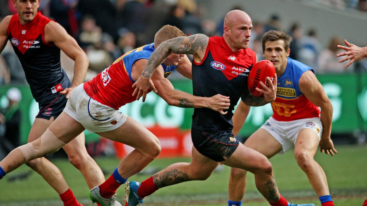 AFL Round 16 - Melbourne v Brisbane Lions at MCG, Melbourne. Nathan Jones on the run. 19th July 2015. Picture: Colleen Petch.