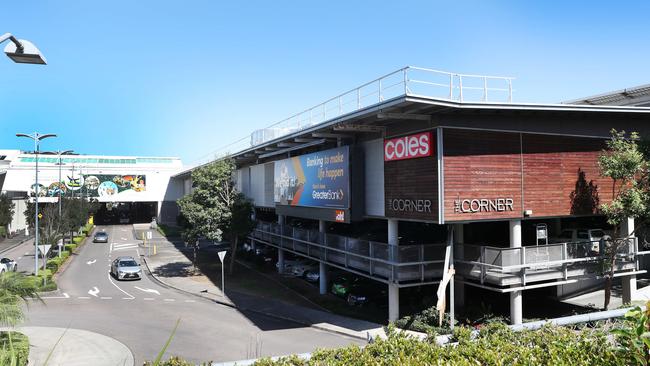 Dreyer looked over the cubicle at a boy urinating in toilets at Erina Fair. (AAP Image/Sue Graham)