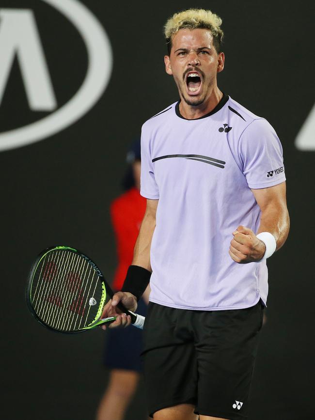 Bolt celebrates his Australian Open win against Gilles Simon in 2019, during which he saved four match points. Picture: Michael Klein