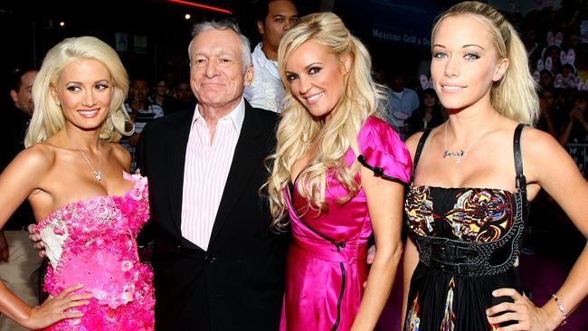 WESTWOOD, CA - AUGUST 20: Playmate Holly Madison, publisher Hugh Hefner, playmate Bridget Marquardt and playmate Kendra Wilkinson arrive at Columbia Pictures' premiere of "House Bunny" held at the Mann Village Theater on August 20, 2008 in Westwood, California. (Photo by Alberto E. Rodriguez/Getty Images)