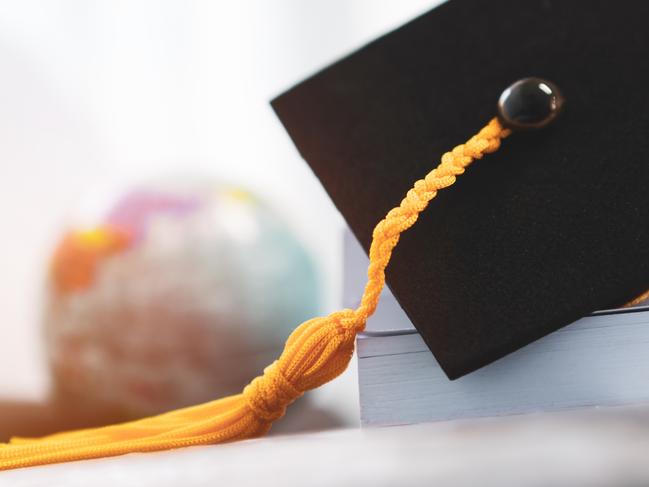 Graduation cap stock image / file picture.