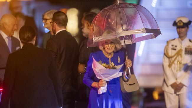 Queen Camilla carried her own umbrella to ward off the rain. Picture: NewsWire / Jeremy Piper