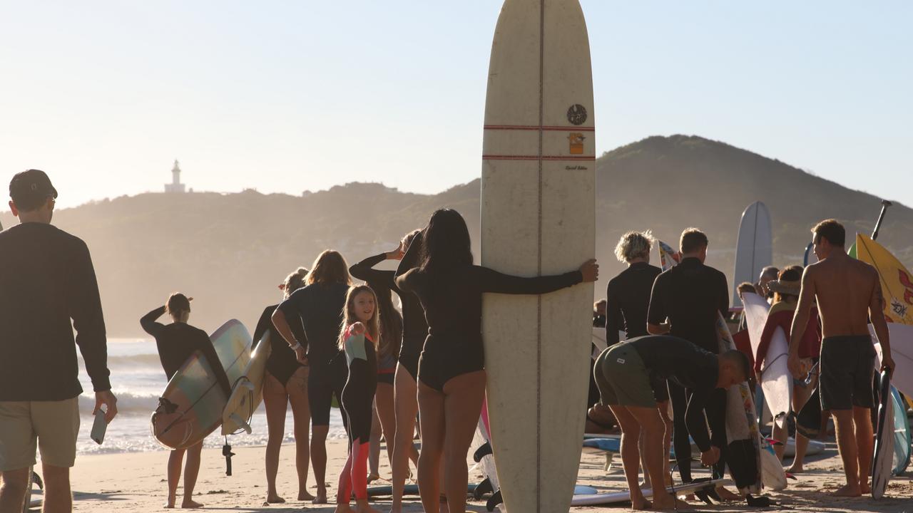 Members of the public took part in a paddle-out at Byron Bay's Main Beach to protest against the planned Netflix reality show Byron Baes on the morning of Tuesday, April 20, 2021. Picture: Liana Boss