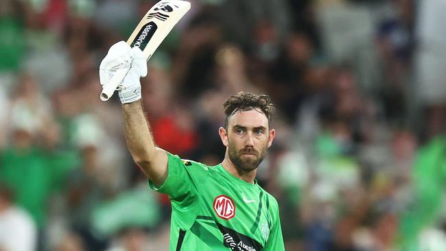 MELBOURNE, AUSTRALIA - JANUARY 19: Glenn Maxwell of the Stars raises his bat after scoring 150 runs during the Men's Big Bash League match between the Melbourne Stars and the Hobart Hurricanes at Melbourne Cricket Ground, on January 19, 2022, in Melbourne, Australia. (Photo by Mike Owen/Getty Images)