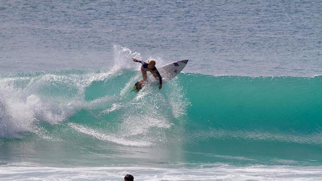 Gold Coast surfer Phoebe Kane cracking a lefthander on her backhand. “I want to be a tenacious surfer that can make the World Tour one day” photo supplied.