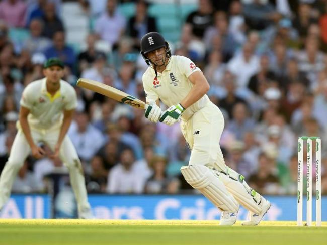 Jos Buttler dug England out of a hole late on day one with an unbeaten half century.