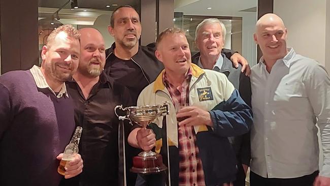 Rebels players Jeremy Clayton (Warracknabeal), Marc Greig (Horsham), Adam Goodes (Horsham), Tim Inkster (Warracknabeal), Shane Sexton (Region Manager Western Region at the time) and Leigh Hutchinson (Warracknabeal) together with the cup. Picture: Marg Richards.