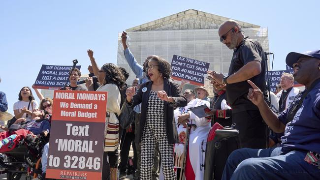 Activists protest against proposed cuts to Medicaid, food stamps and federal aid in President Donald Trump's spending and tax bill on Monday. Picture: AP /J. Scott Applewhite