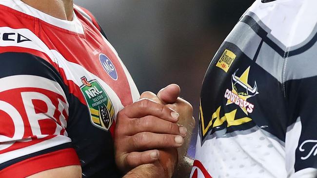 The NRL has banned players shaking hands. Picture: Getty Images