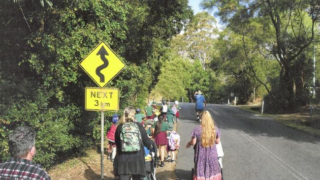 Families at risk on busy hinterland roads due to the lack of footpaths outside schools at Springbrook in the Gold Coast hinterland.