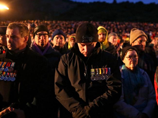 GALLIPOLI, TURKEY - APRIL 25: Visitors from Australia and New Zealand attend a dawn ceremony marking the 100th anniversary of the Battle of Gallipoli, at Anzac Cove on April 25, 2015 in Gallipoli, Turkey. Turkish and Allied powers representatives, as well as family members of those who served, are commemorating the 100th anniversary of the Gallipoli campaign with ceremonies at memorials across the Gallipoli Peninsula. The Gallipoli land campaign, in which a combined Allied force of British, French, Australian, New Zealand and Indian troops sought to occupy the Gallipoli Peninsula and the strategic Dardanelles Strait during World War I, began on April 25, 1915 against Turkish forces of the Ottoman Empire. The Allies, unable to advance more than a few kilometers, withdrew after eight months. The campaign cost the Allies approximately 50,000 killed and up to 200,000 wounded, the Ottomans approximately 85,000 killed and 160,000 wounded. (Photo by Gokhan Tan/Getty Images)