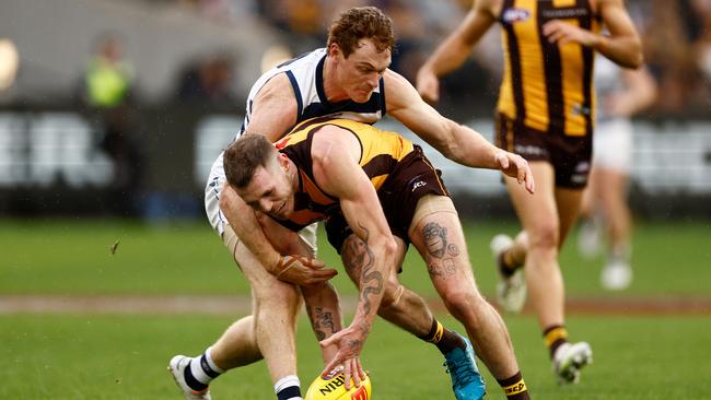 Gary Rohan tackles Blake Hardwick at the MCG. Picture: Michael Willson/AFL Photos