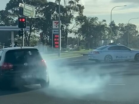 A motorist has captured the moment a car leads police on a pursuit in Wollongong. Picture: Nikki Ristoski/Facebook