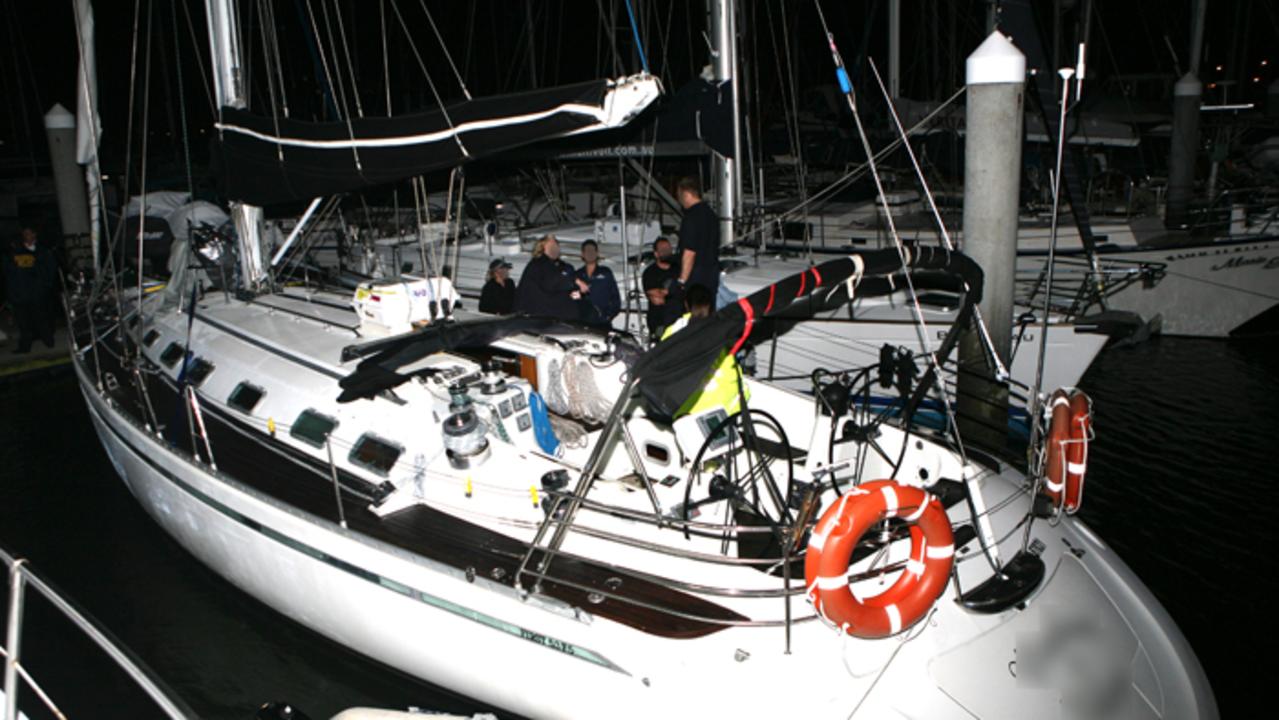 AFP and Customs officers board the yacht moored at the Scarborough Marina, north of Brisbane where Australian Federal Police and Customs and Border Protection Service joined forces with NSW and Queensland police to seize 464kg of cocaine off the southern coast of Queensland, the third largest cocaine haul in Australian history.
