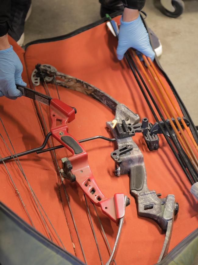 A mechanical bow was one of the weapons uncovered by police in the raid.