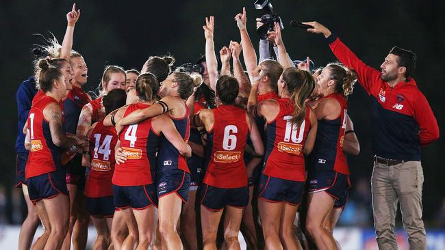 Melbourne players celebrate their win over Brisbane. Picture: Getty Images