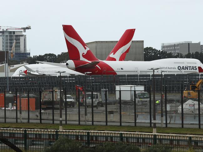 Qantas planes are seen parked at Sydney Airport. Picture: Brett Costello