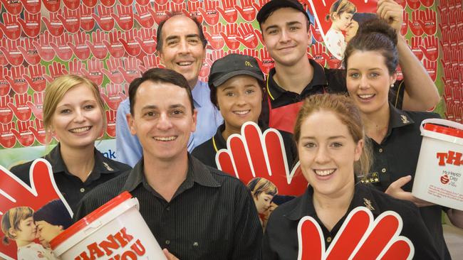 Rod Chiapello (third from left) with staff Brittney Dalton, Sasha Menesi, Amber Robertson-Cole, Cameron Green, Lauren Morris-Bowley and Amanda Horrigan. Picture by Russell Brown during a McHappy Day event in 2013.