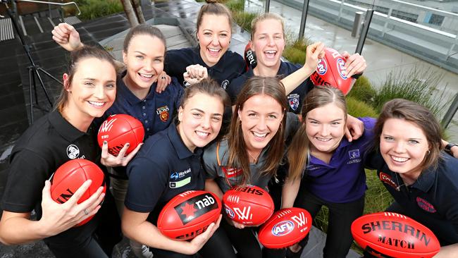Collingwood recruit Nicola Stevens (left) with fellow draftees Emily Bates (Brisbane), Bianca Jakobsson (Carlton), Ebony Marinoff (Adelaide), Jaimee Lambert (Western Bulldogs), Nicola Barr (GWS), Hayley Miller (Fremantle) and Elise O’Dea (Melbourne). Picture: Tim Carrafa