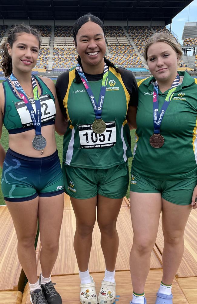 St Peters Lutheran College, Springfield student, Allira Takau, middle, with Dannielle Jones, left, Hubbards School