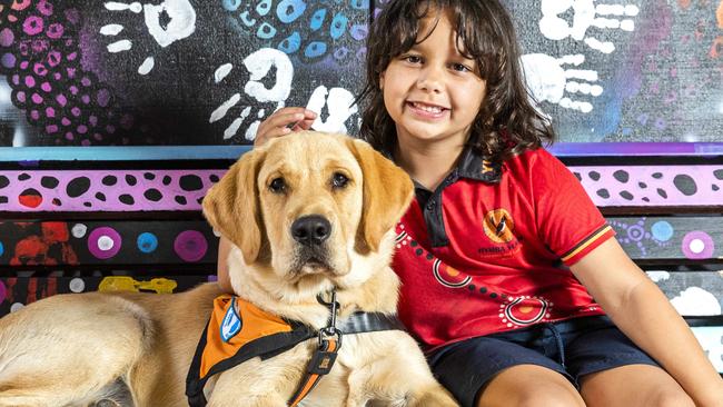 Hymba Yumba Independent School student Pania Thomsen-Kingi with Empower Assistance Dog 'Akuna'. Picture: Richard Walker