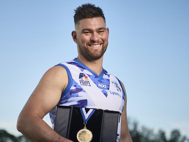Magarey Medallist, Mitch Grigg at the Max Amber Sportsfield in Paradise, with the new medal honouring his father, Chris Grigg who died as a result of MND last year, Thursday, Aug. 3, 2023. Picture: Matt Loxton
