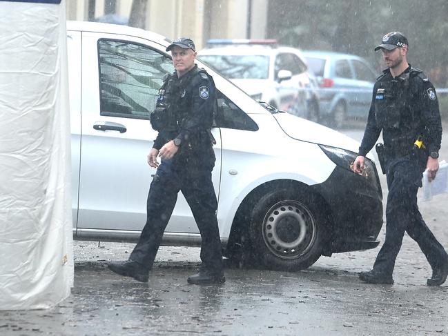 Police at the scene in Central Place, Emerald Lakes, Carrara on the Gold Coast on Wednesday. Picture: John Gass/NCA NewsWire