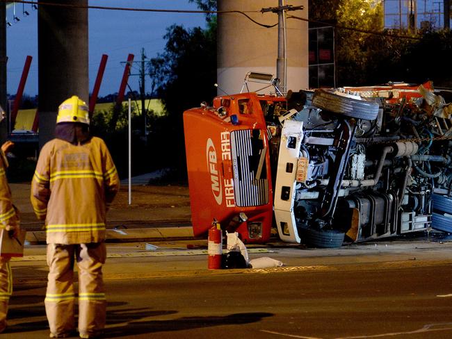 Fire truck overturned in Flemington. Picture: Nicole Garmston