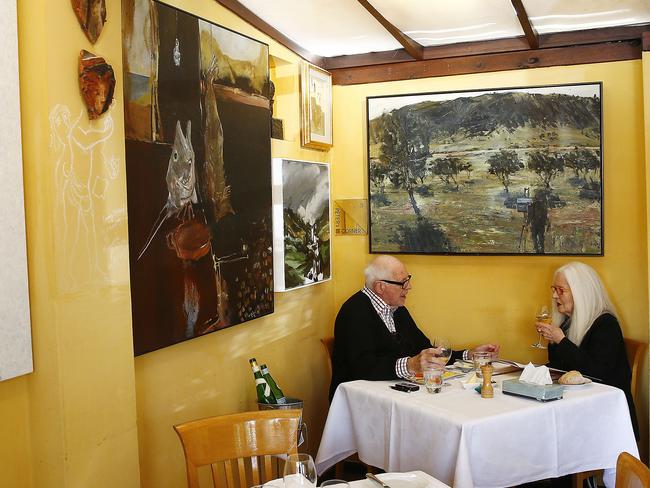 Leo Schofield and Roslyn Oxley talk over oysters. Picture: John Appleyard