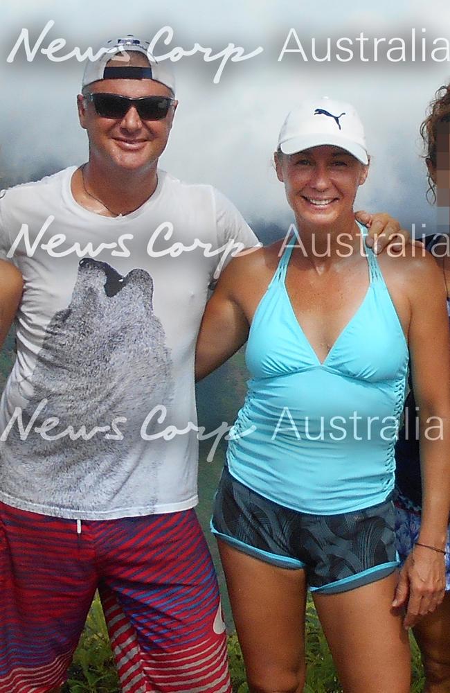 John and Yvette Nikolic hiking in Tahiti. Picture: Jeff Hassell.