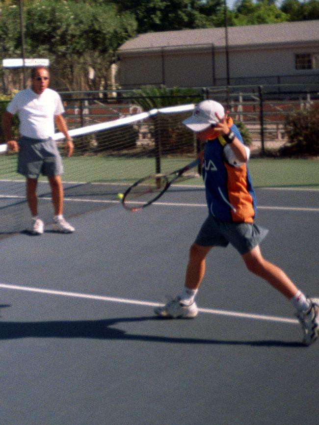 Todd Ley at 11 with legendary coach Nick Bollettieri. Picture: Barry O'Brien