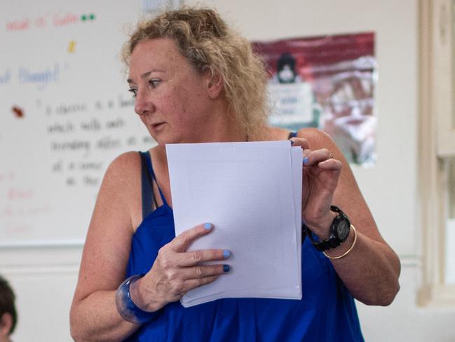 22/03/2024. Network News, Ashfield, Sydney, NSW, Australia.Profile pictures to go with a ÃDay in the LifeÃ of English school teacher Alex Whitting at Ashfield Boys High School in Ashfield, Sydney.Alex photographed during her Year 11 English Extension ClassPicture: Julian Andrews