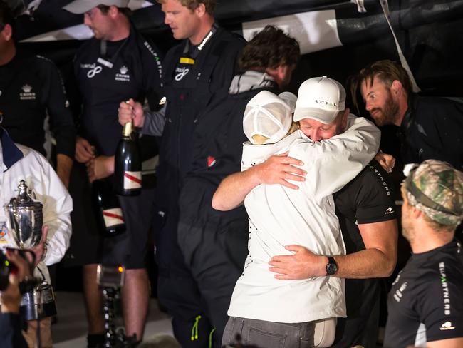 Landry hugs her husband at Constitution Dock after winning the 2016 Sydney To Hobart. Picture: Heath Holden/Getty Images