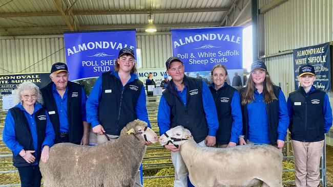 Members of the Routley family from Almondvale at Urana. Marita, Peter, Lachlan, 16, Paul, Dalles, Grace, 14 and Ruby with one of their Poll and White Suffolk rams. Picture: Supplied