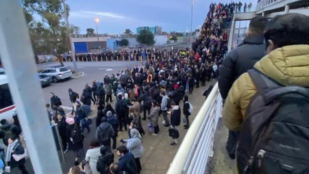 Commuters were left lining up for meters just to get on a replacement bus at Dandenong station. Picture: Reddit @currentlyontrain