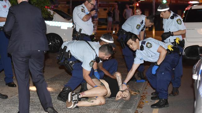 Police found the woman lying on the ground where she was handcuffed. Picture: Gordon McComiskie