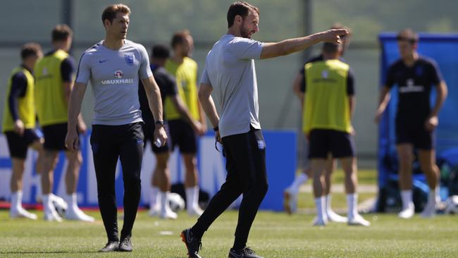 England manager Gareth Southgate takes his team through a training session. Photo: AP