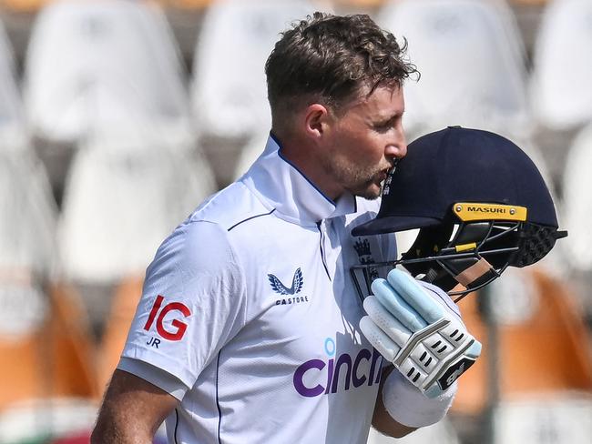 TOPSHOT - England's Joe Root celebrates after scoring double century (200 runs) during the fourth day of the first Test cricket match between Pakistan and England at the Multan Cricket Stadium in Multan on October 10, 2024. (Photo by Aamir QURESHI / AFP)