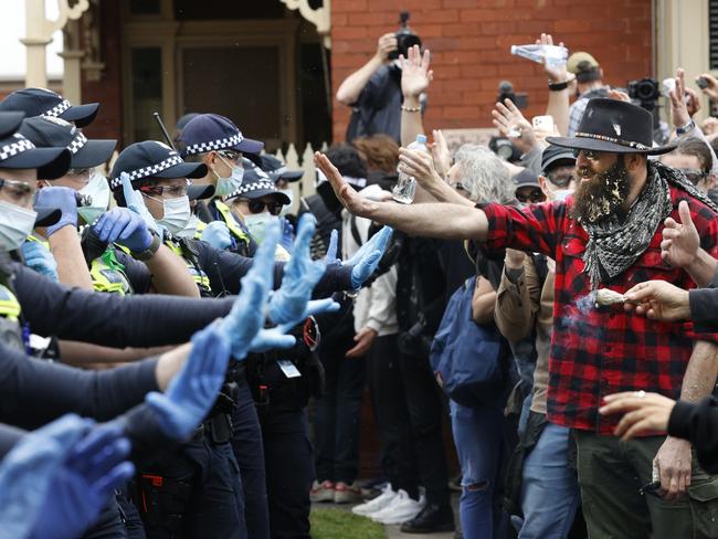 Anti-lockdown protesters face off against police in Richmond. Picture: Alex Coppel