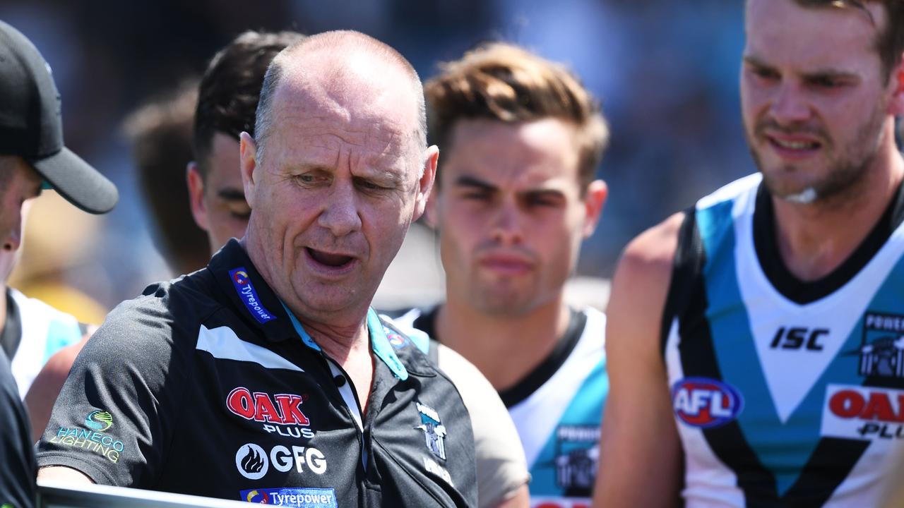 Ken Hinkley won’t be leaving Port Adelaide in the off-season. Photo: Mark Brake/Getty Images.