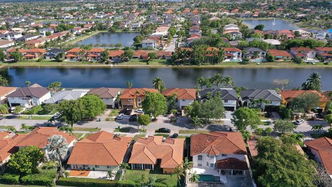 MIAMI, FLORIDA - MAY 10: In an aerial view, single family homes are shown in a residential neighborhood on May 10, 2022 in Miami, Florida. New published data has hinted at improvement in the supply of homes for sale as April's numbers show inventory down 12 percent from the same month last year, the smallests yearly decline since the end of 2019. Joe Raedle/Getty Images/AFP == FOR NEWSPAPERS, INTERNET, TELCOS &amp; TELEVISION USE ONLY ==