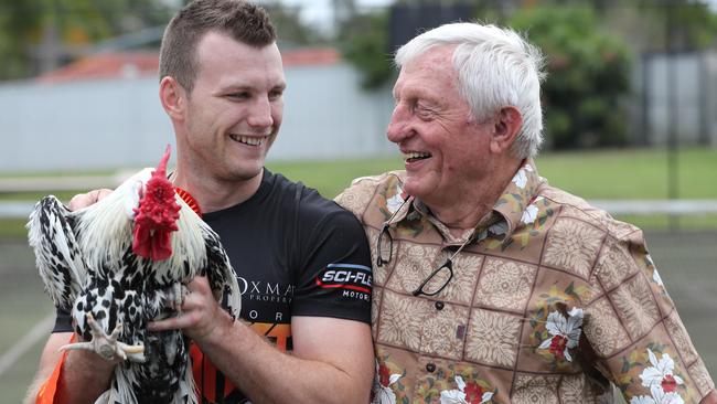 Jeff Horn with his grandad Jack Dykstra with his champion chicken before training at his Stretton Boxing Gym. Pic Peter Wallis