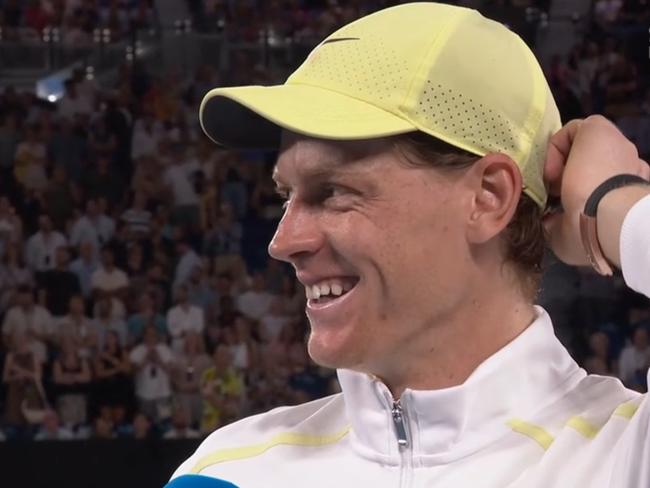 Jannik Sinner speaking to Jim Courier post match. Photo: Stan Sport