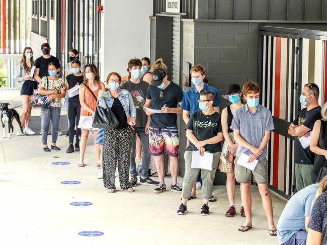 People queuing at the Cavendish Road State High School pop-up vaccine clinic. Picture: Richard Walker