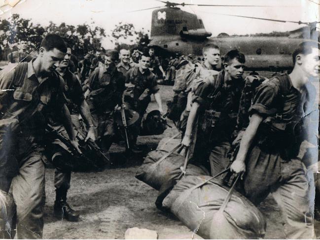 “C Company 2RAR disembarking from helicopters at Nui Dat South Vietnam. Robert Hoop Hooper is pictured third from the left looking left. We sailed from Brisbane to Vung Tau, then took Chinook helicopters to the task force to begin our time.” Picture: Supplied by Robert Hoop Hooper