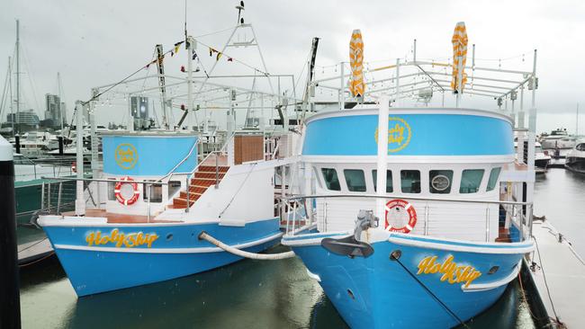 There is a new venue on the Gold Coast Called Holy Ship. They have converted two 1970 timber trawlers to a bar and restaurant that operate side by side on the Broadwater. Owners Jake Ruttley, Yvette McCarthy and Kane McCarthy toast their success. Picture Glenn Hampson