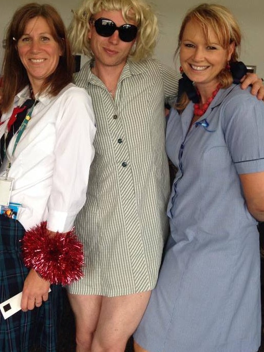 New Chief Executive of Burnside Council Chris Cowley (centre) at a council dress-up party.